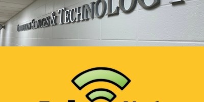 The Information Services and Technology office sign pictured above the FalconNet logo.