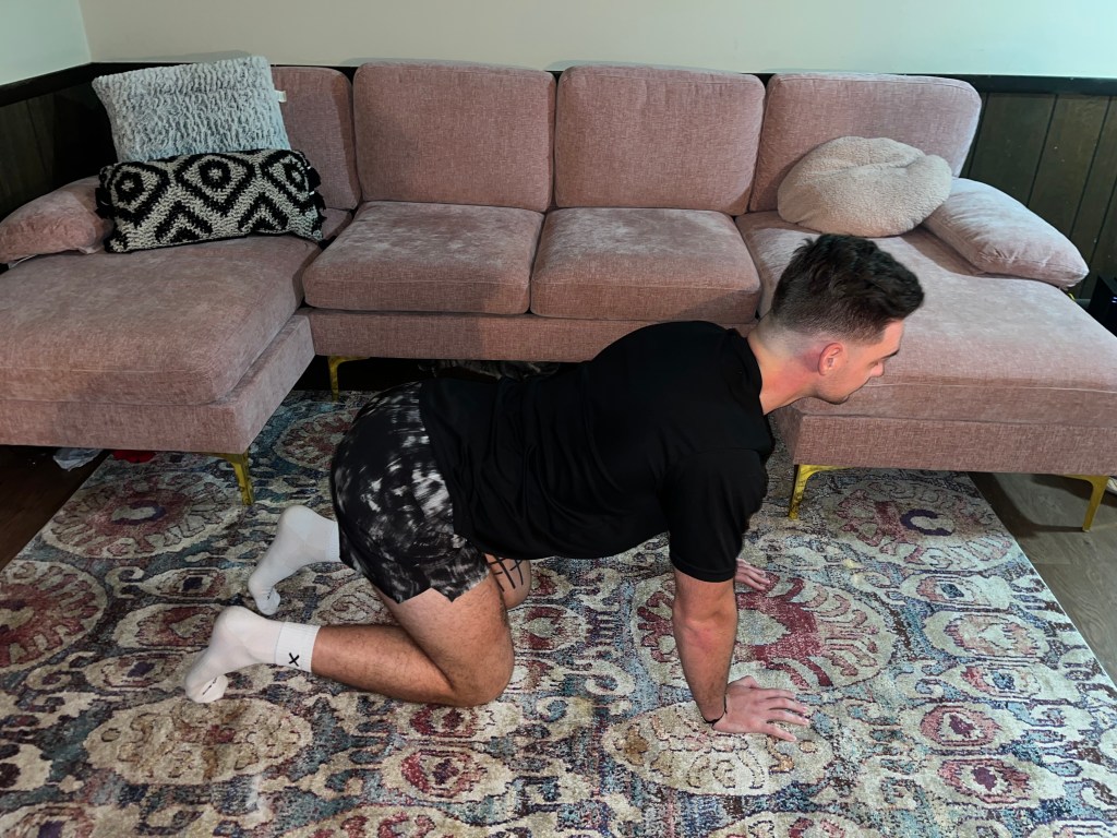 Man demonstrating a lumbar movement.