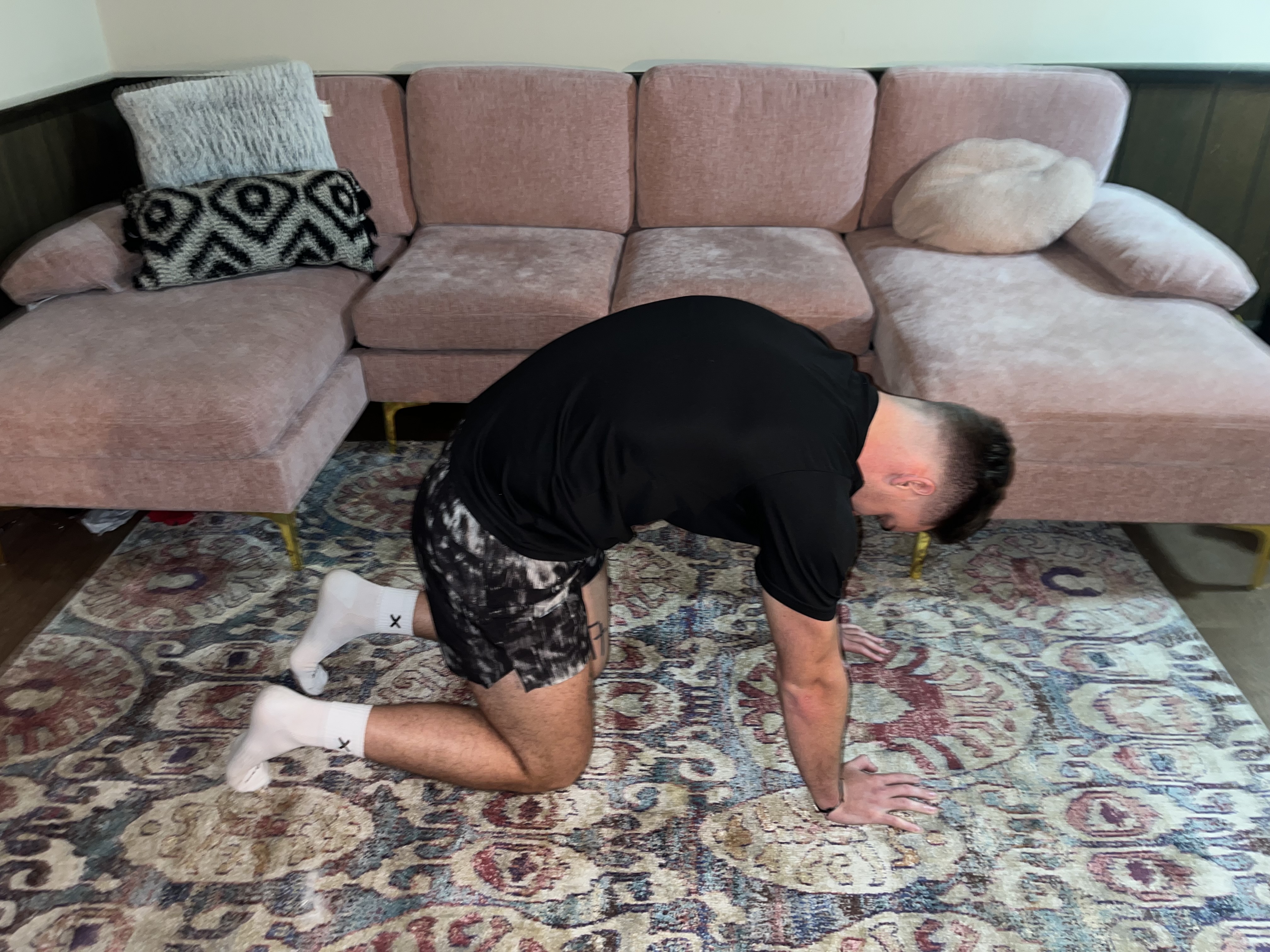 Man demonstrating a lumbar movement.