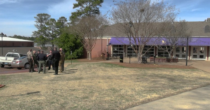 Police gather outside of Farmer hall