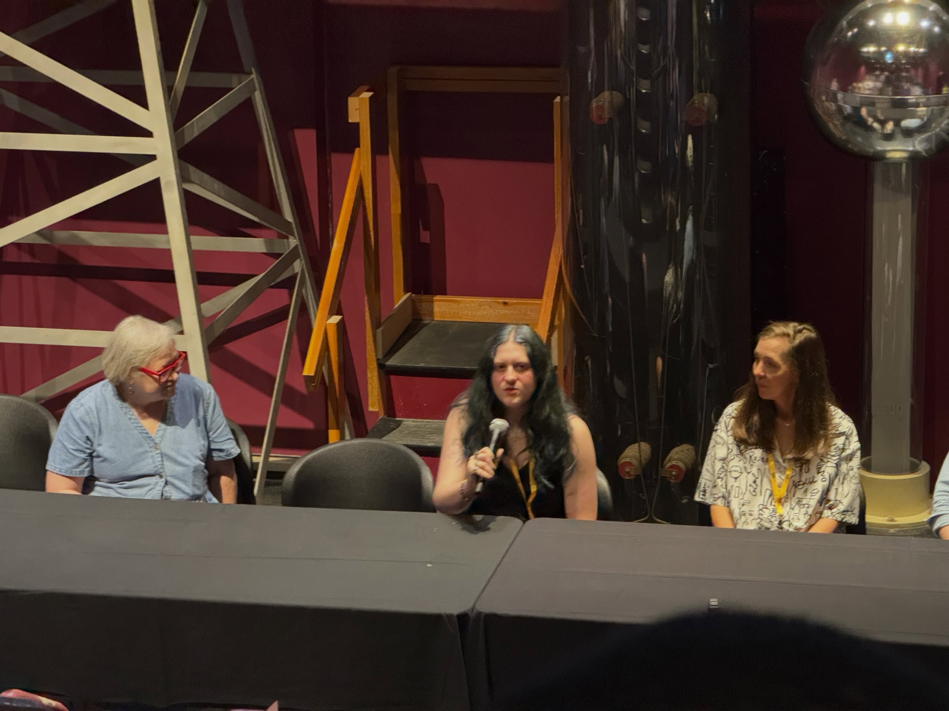 Jude Copeland sits with fellow Sidewrite Award recipients during the Q&A portion of the table read.