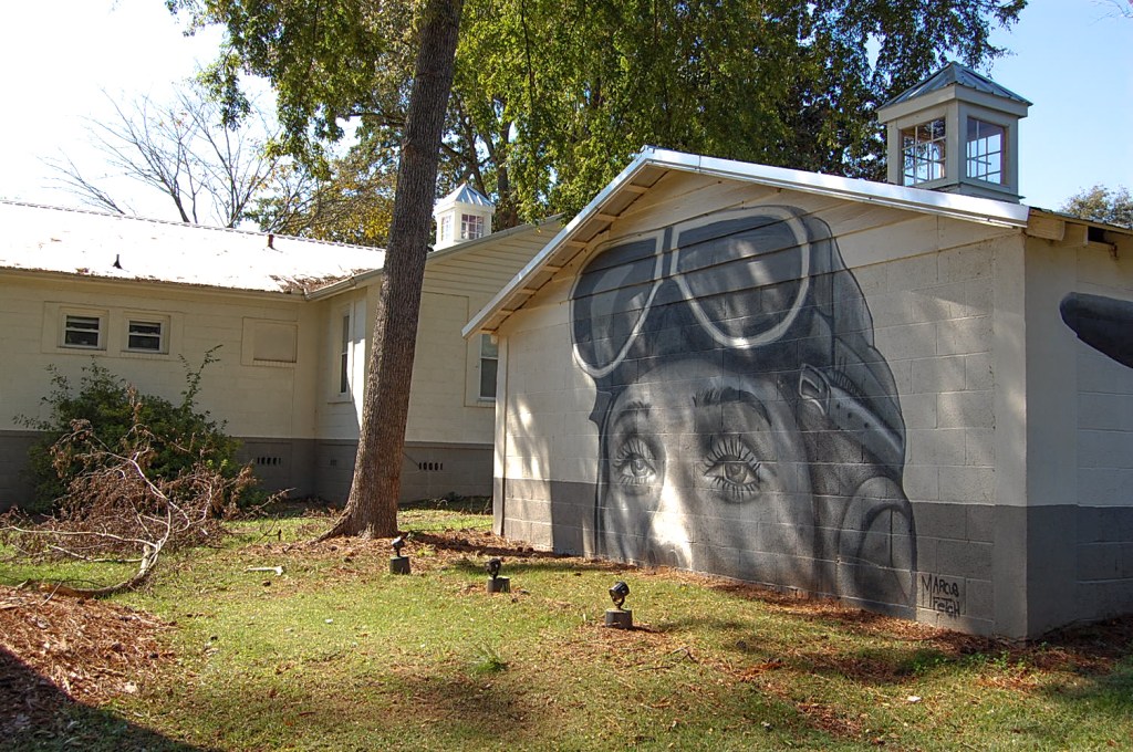 painted garage of black and white portrait of Amelia Earhart