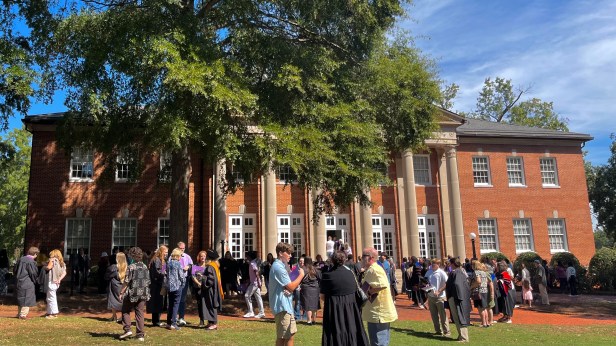 People standing outside a building