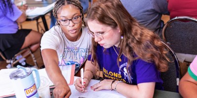two girls studying